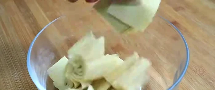 Bake the tofu skin in a preheated oven at a suitable temperature until crispy.