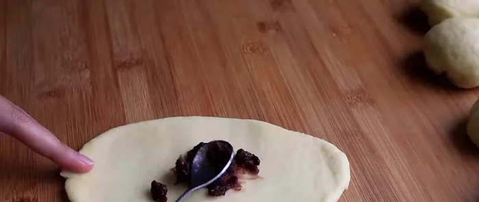 Shape each portion into a ball and flatten slightly.