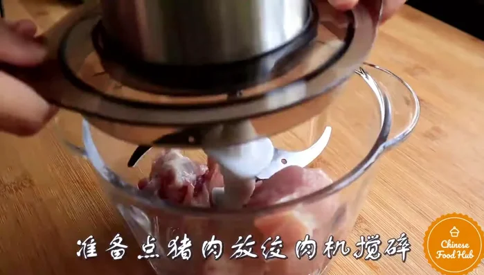 Stuff the peppers: Fill each green pepper with the prepared pork mixture.