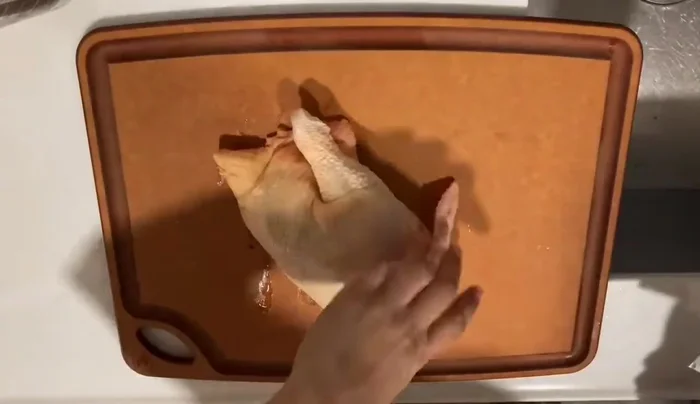 Season the chicken.