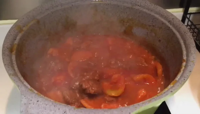 Simmer until the beef is tender and the sauce has thickened.