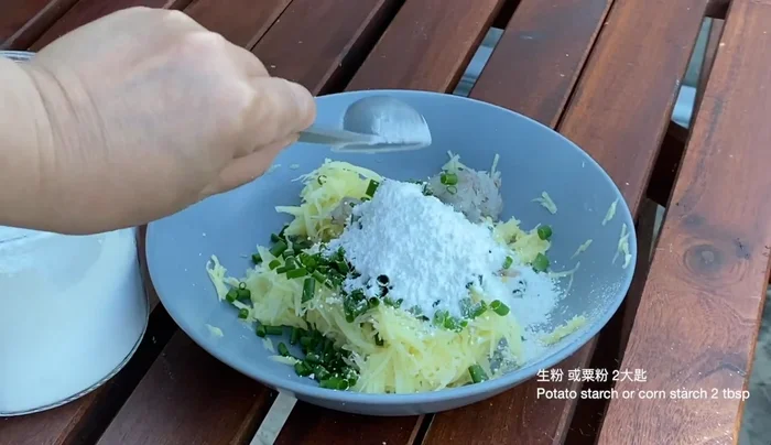 Fry until golden brown and crispy on both sides. (Cooking time is unspecified, but likely 2-3 minutes per side.)
