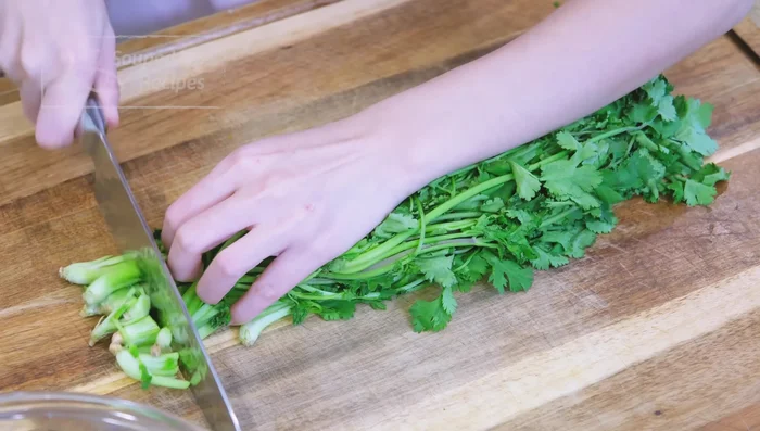 After dehydrating, cut the cilantro into 1-inch long pieces (55.6).