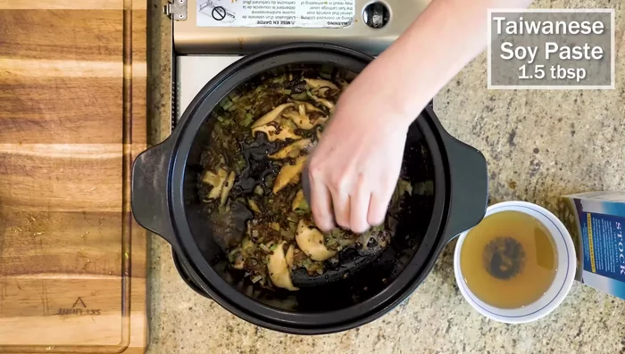 Season with salt, soy sauce, and Taiwanese soy paste (or oyster sauce). Stir until sizzling and caramelizing.