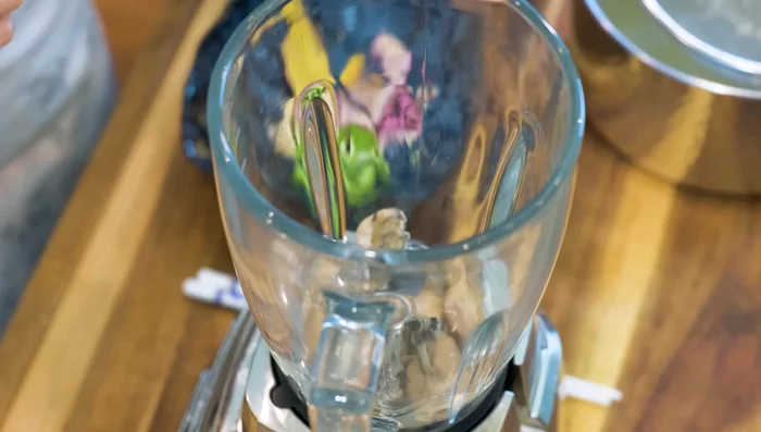 Blend the blanched oysters, ginger, garlic, scallion, shallot, and 1 cup of the salt water solution into a smooth puree.