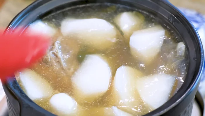 Season the soup with fish sauce to taste. It should be saltier than your usual preference.