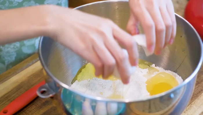 In a bowl, pre-mix flour, eggs, and salt using a spatula. (If using a stand mixer, this step is optional)