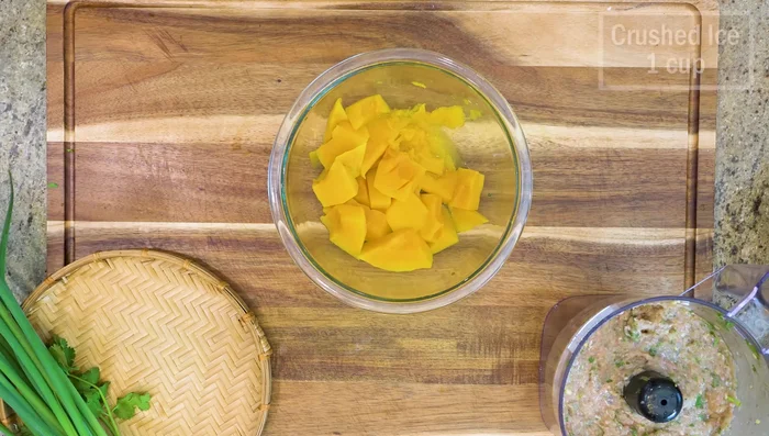 Puree the squash: Add crushed ice to the cooked squash and blend until smooth.