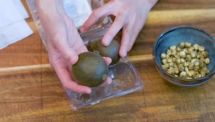 Make monk fruit and chrysanthemum tea: Simmer monk fruit, licorice root, and chrysanthemum flower in water, cool.