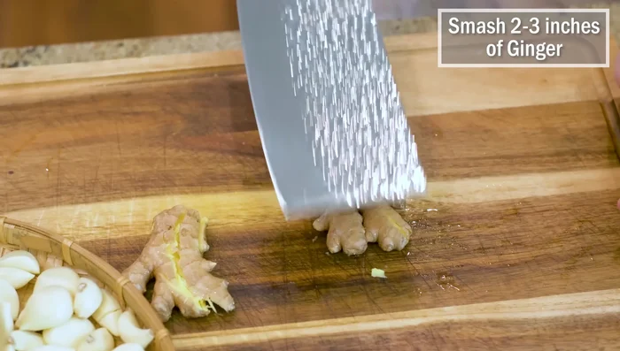 Prepare aromatics (ginger, garlic, scallions): Mince, slice, julienne.