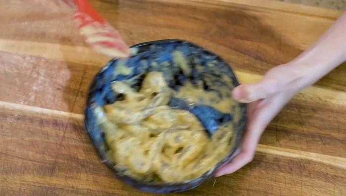 Make crispy shrimp: Fry shrimp in hot oil, then serve on bed of crispy rice noodles.