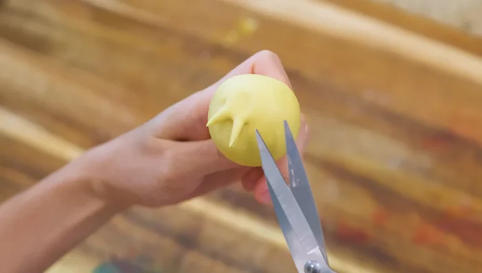 Flower 2: Repeat the process, but start cutting from the opposite side of the chopstick for a different design (259.04).