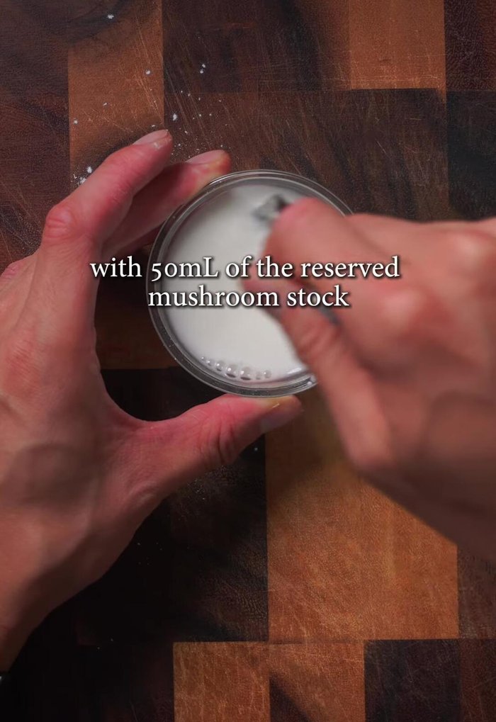 Prepare potato starch slurry with 50 mls of mushroom stock and set up a bowl of ice water.