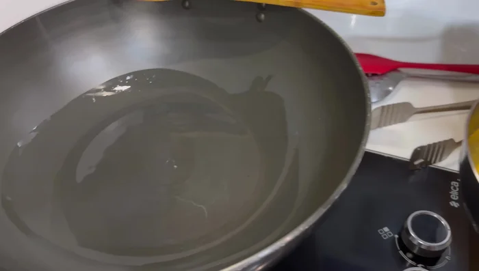 Fry an egg with a pinch of salt and pepper.