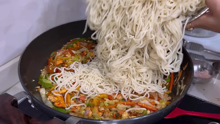 Add the noodles and mix gently.