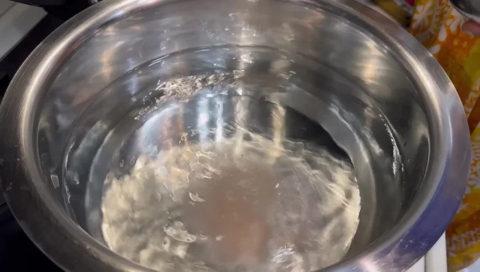 Boil water in a pot. Add salt (2 spoons) and oil (2-4 drops) to prevent noodles from sticking.