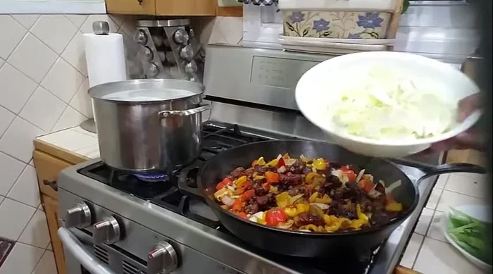 Add optional cabbage and cook for about a minute.