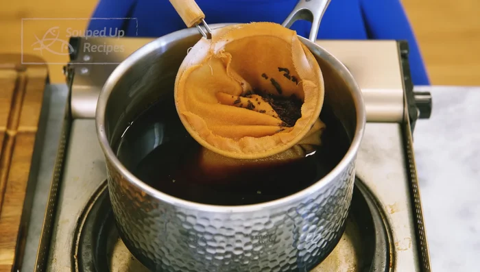 Repeat the jua process for another 8 minutes, followed by another latcha process (four pours).