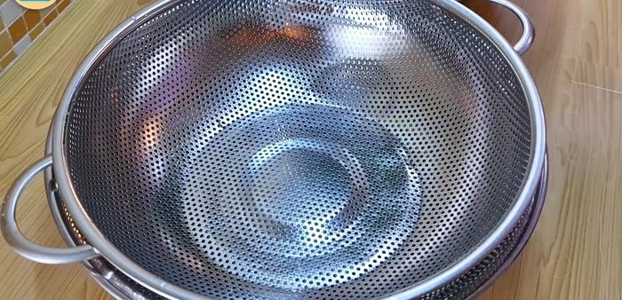 Remove the choy sum from the water and place in a colander to drain excess water.