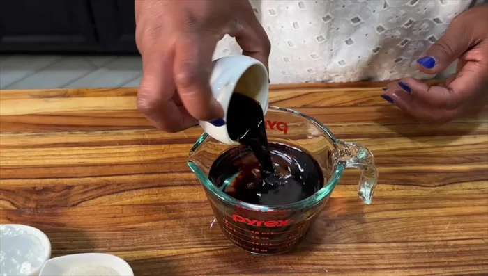 Make the slurry: Mix water, soy sauce, sugar, cornstarch, dark soy sauce, and toasted sesame oil.