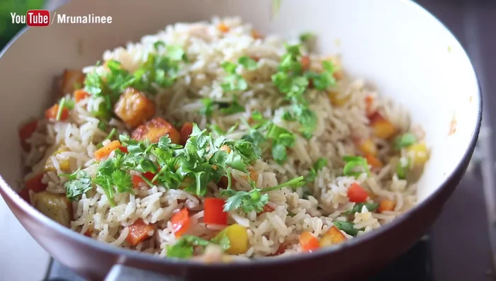 Add fresh coriander leaves, spring onions, and 1 spoon of butter.